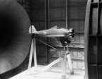 A BOEING P-26 AEROPLANE IN THE WIND TUNNEL TEST RIG.